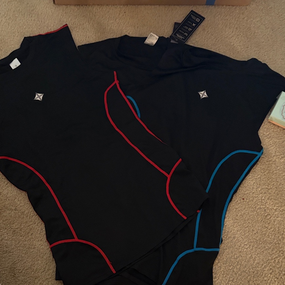 Black Athletic Shirts with Red and Blue Accents